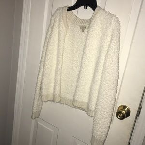 white fuzzy zip up sweatshirt